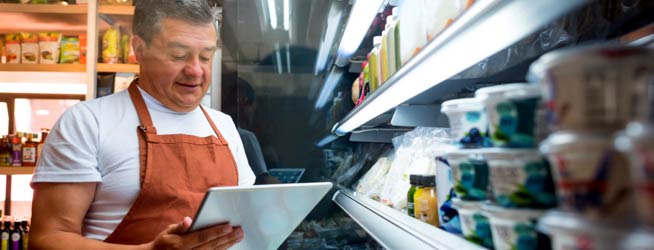 Worker taking inventory