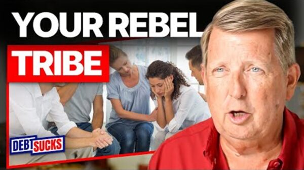 A video thumbnail featuring bankruptcy attorney Ben Matthews in a red shirt, next to a framed image of a support group comforting a distressed woman, with bold text reading "YOUR REBEL TRIBE" and a "DEBT SUCKS" logo in the bottom corner.